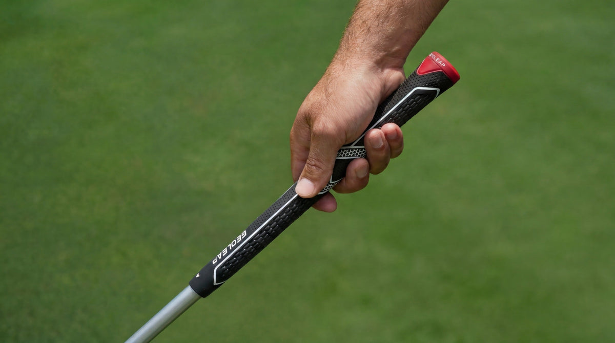 Geoleap golf grip held at address on the course